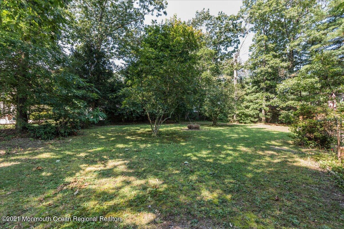 41 Haines Street Lanoka Harbor, NJ 08734 - Photo 35 of 43 a view of outdoor space with deck and yard