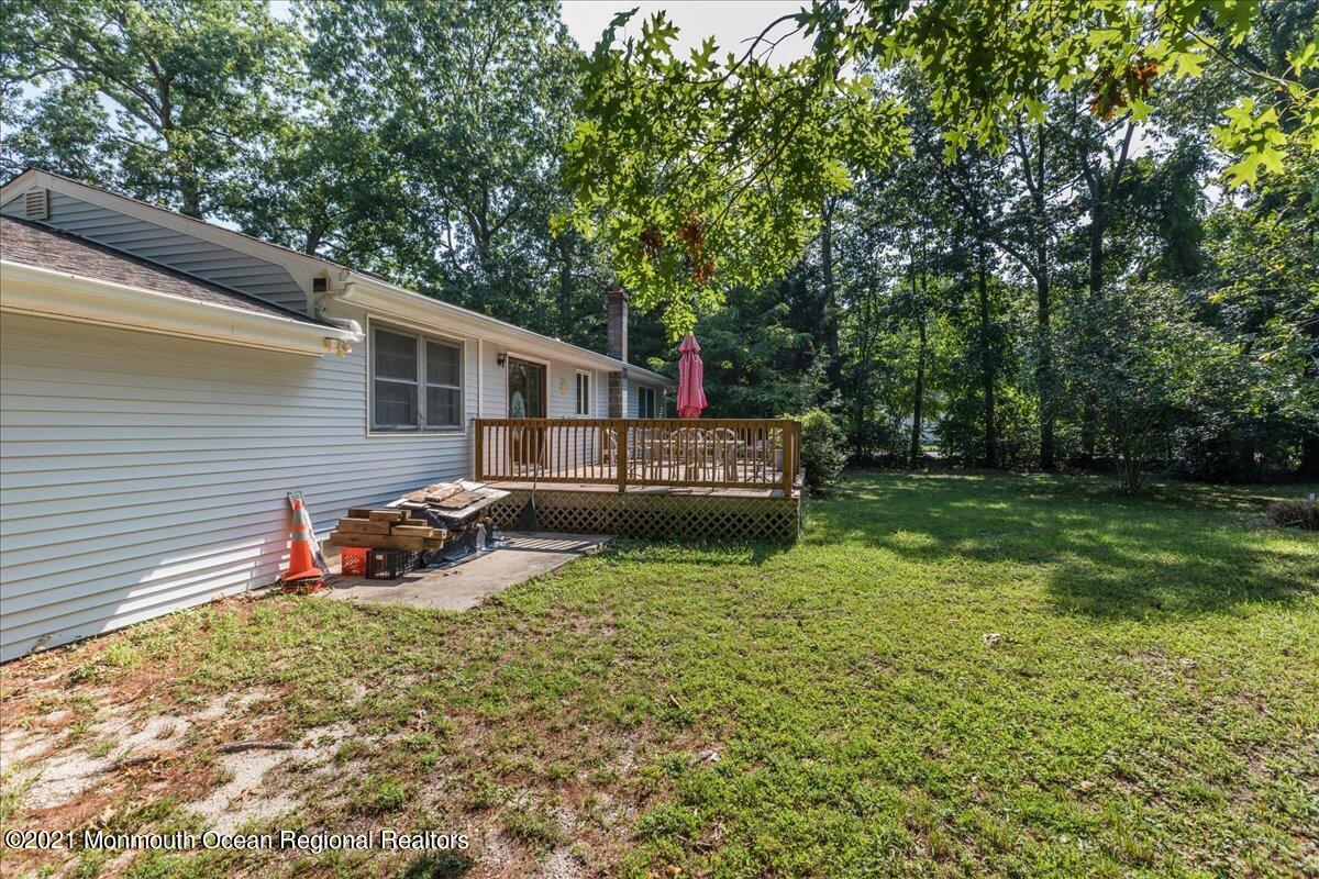41 Haines Street Lanoka Harbor, NJ 08734 - Photo 39 of 43 a view of house with backyard and sitting area