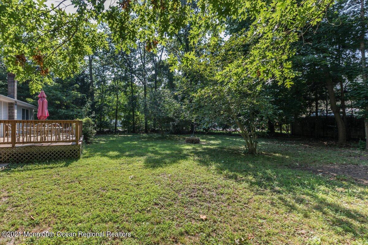 41 Haines Street Lanoka Harbor, NJ 08734 - Photo 40 of 43 a view of a house with a yard