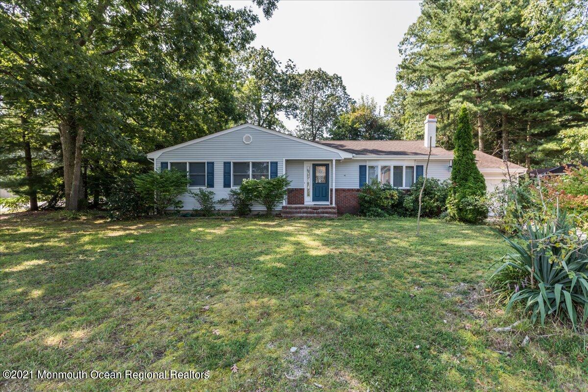 41 Haines Street Lanoka Harbor, NJ 08734 - Photo 43 of 43 a front view of a house with garden