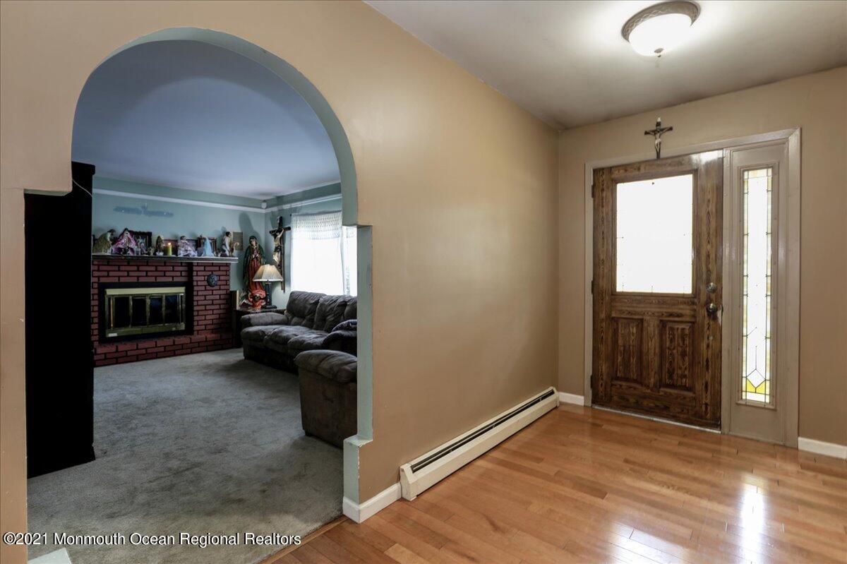 41 Haines Street Lanoka Harbor, NJ 08734 - Photo 7 of 43 a view of livingroom with furniture and a flat screen tv