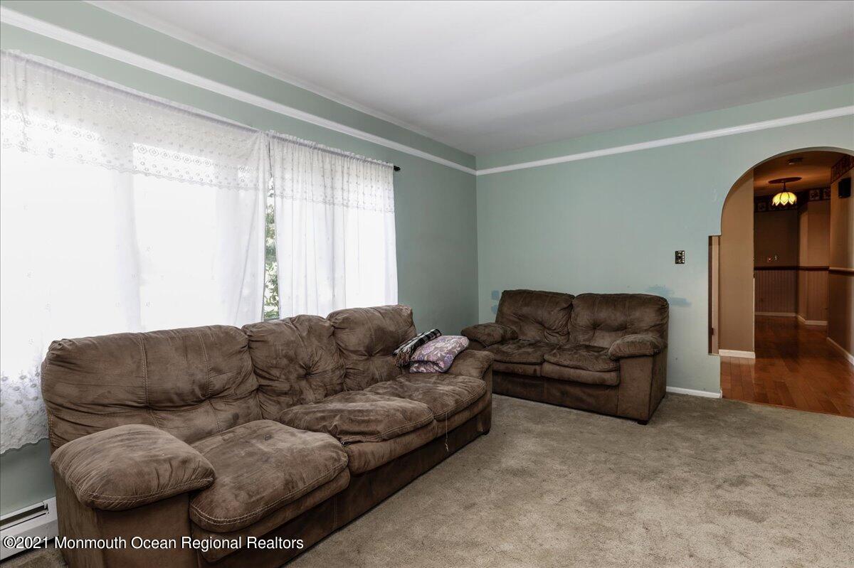 41 Haines Street Lanoka Harbor, NJ 08734 - Photo 9 of 43 a living room with furniture and a couch