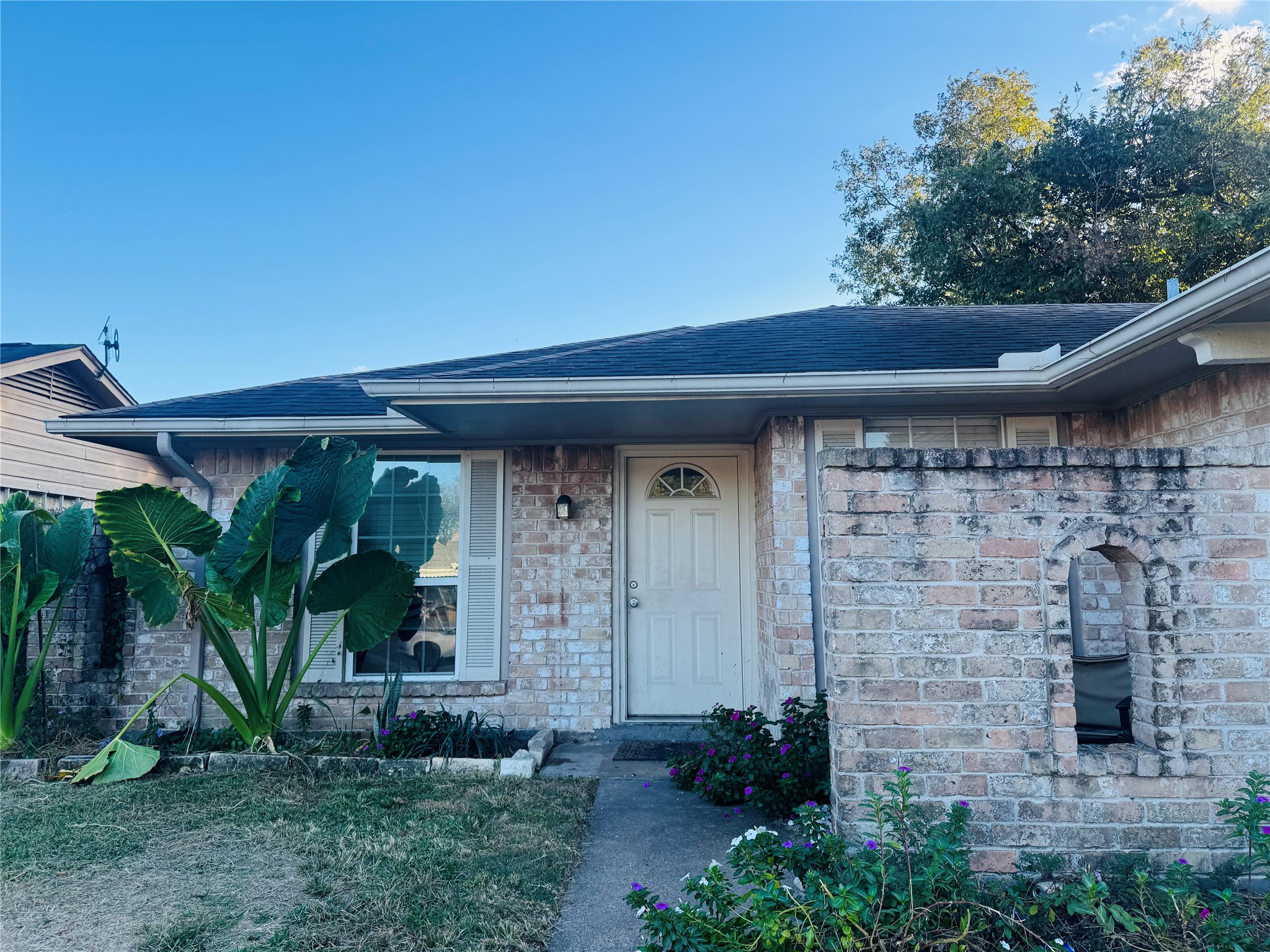 4414 Debeney Drive Houston, TX 77039 - Photo 2 of 6 a front view of a house with garden