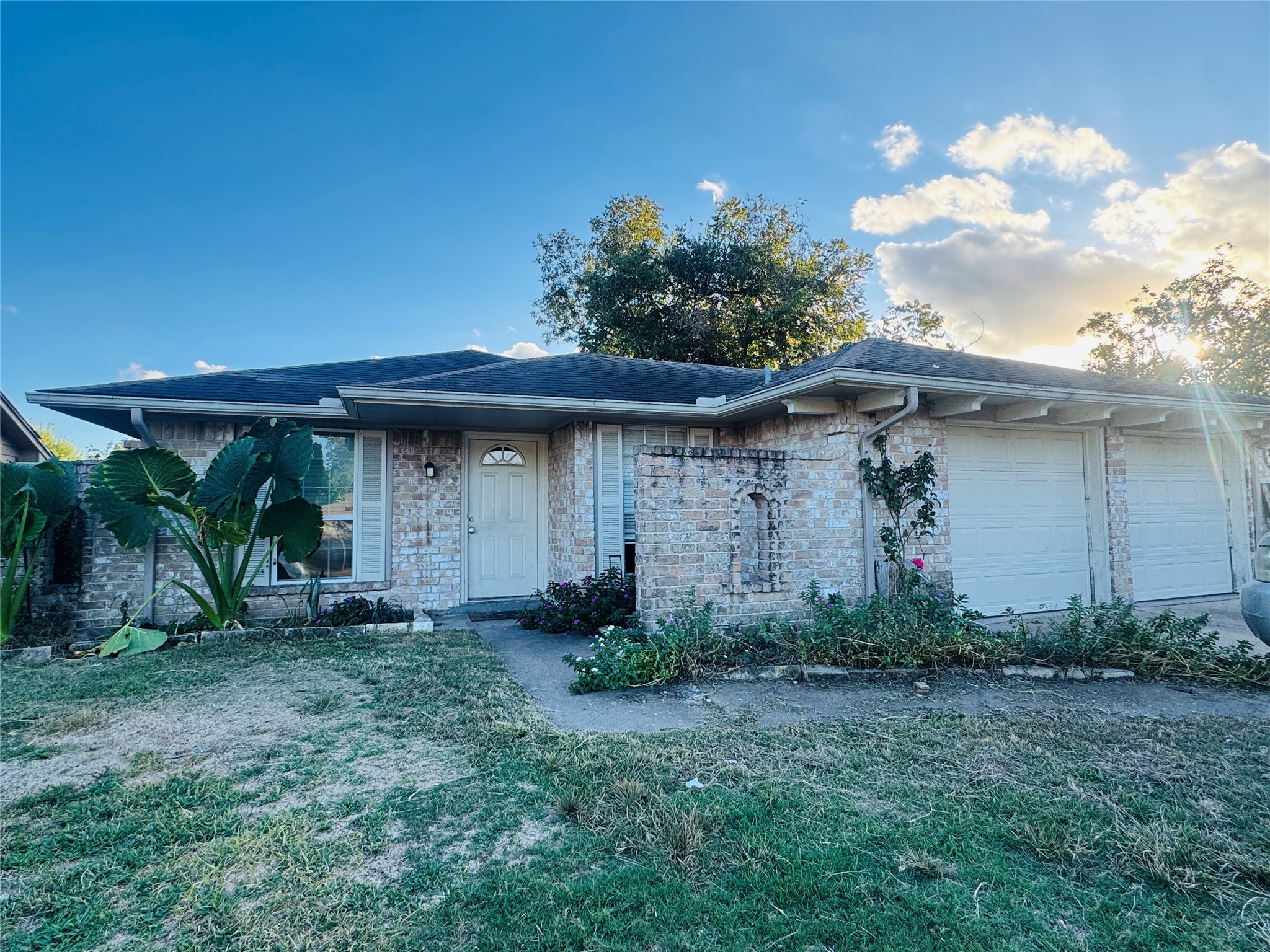4414 Debeney Drive Houston, TX 77039 - Photo 3 of 6 a front view of a house with garden