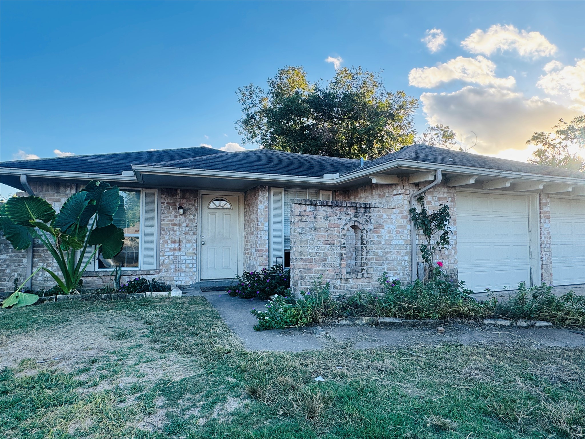 4414 Debeney Drive Houston, TX 77039 - Photo 5 of 6 a front view of a house with garden