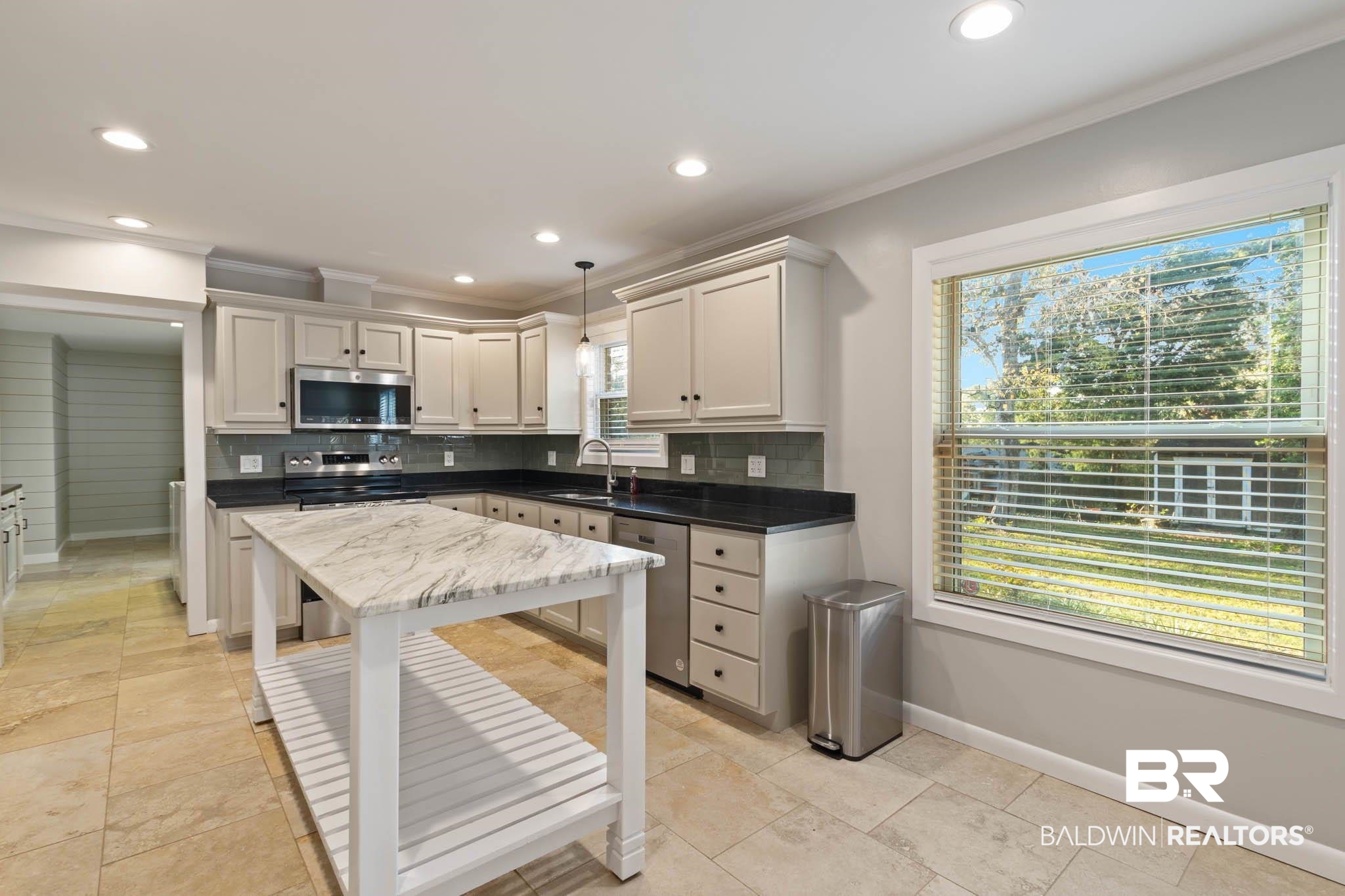 608 Southern Way Daphne, AL 36527 - Photo 8 of 35 Kitchen featuring hanging light fixtures, decorative backsplash, stainless steel appliances, ornamental molding, and recessed lighting