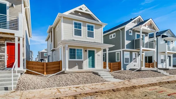 a front view of a house with backyard