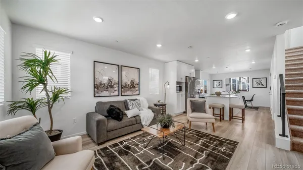 a living room with furniture and a couch