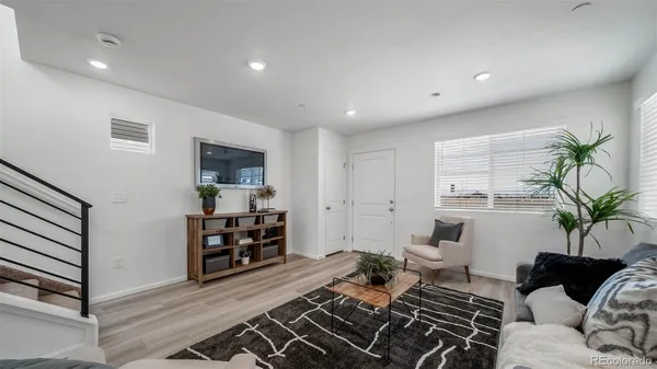 a living room with furniture and a couch