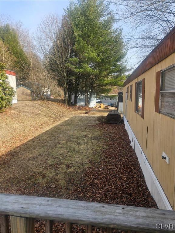 44 Apache Lehighton, PA 18235 - Photo 2 of 18 a view of a yard with wooden fence