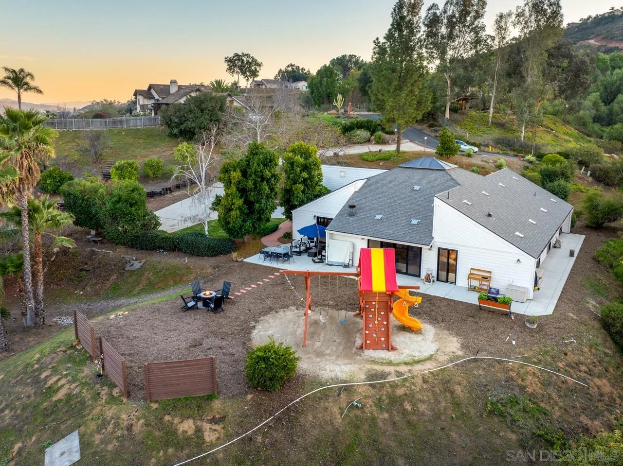 11869 Hi Ridge Road Lakeside, CA 92040 - Photo 3 of 73 an aerial view of a house with swimming pool and a yard