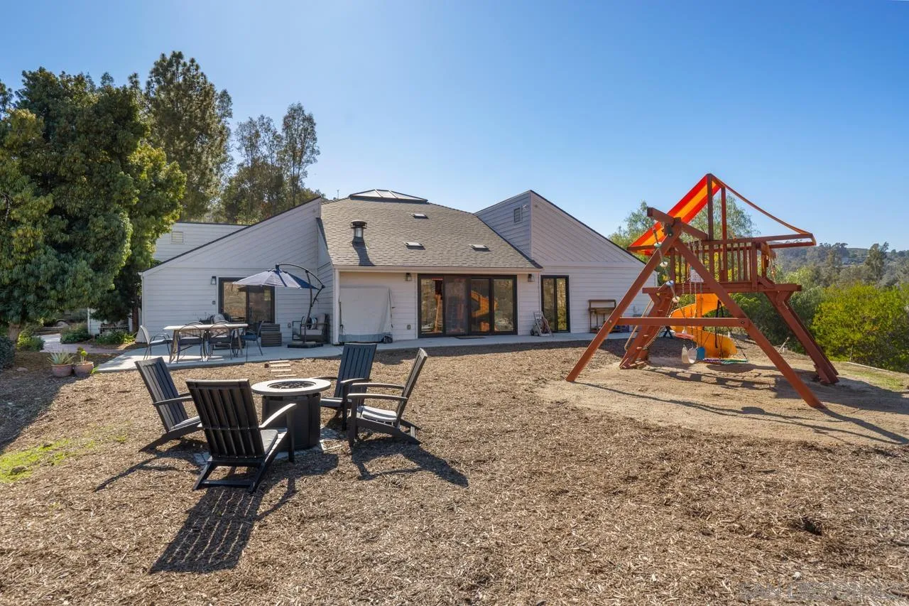 11869 Hi Ridge Road Lakeside, CA 92040 - Photo 64 of 73 a backyard of a house with table and chairs