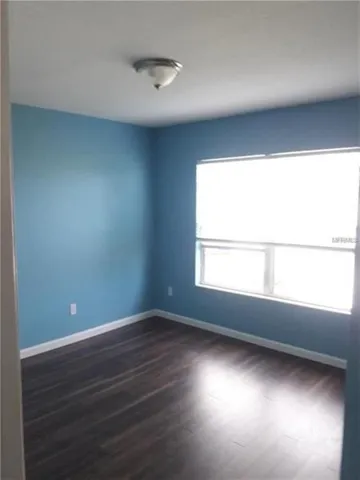 a view of swimming pool from a yard