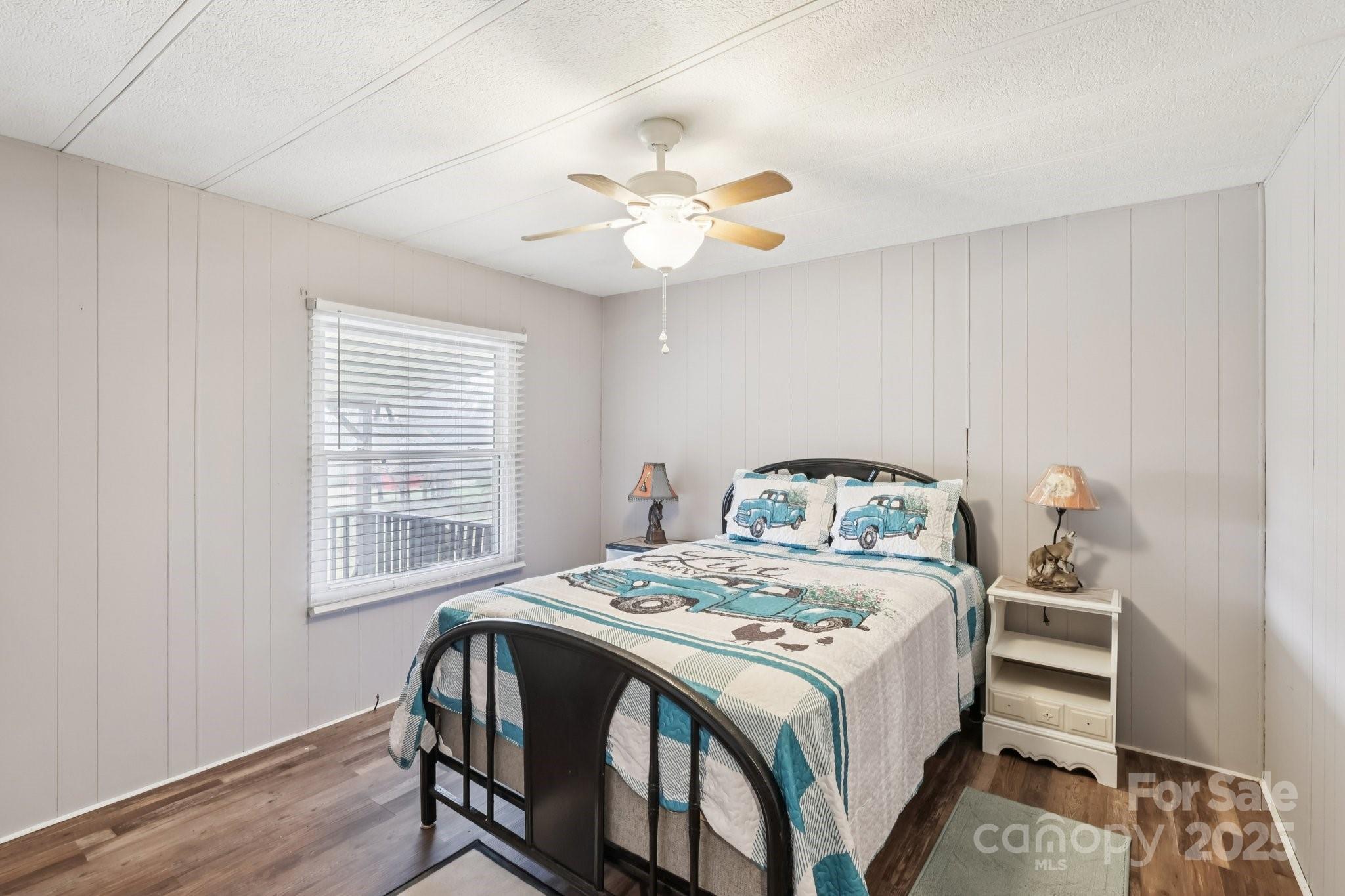 920 Dewitt Helms Road Monroe, NC 28112 - Photo 22 of 47 a bedroom with a bed and a window