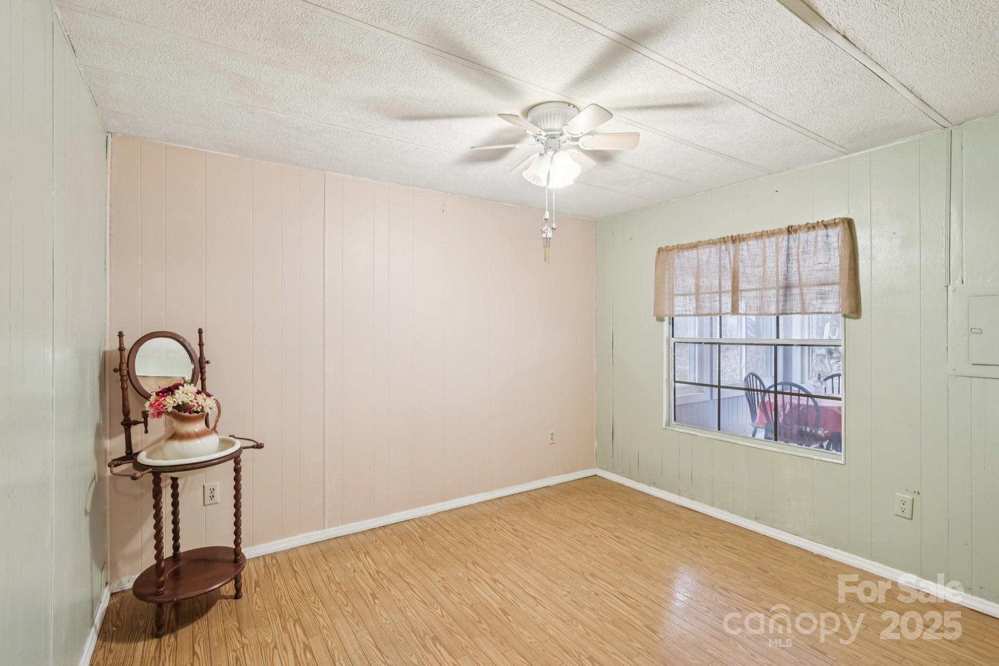 920 Dewitt Helms Road Monroe, NC 28112 - Photo 24 of 47 an empty room with windows and fan