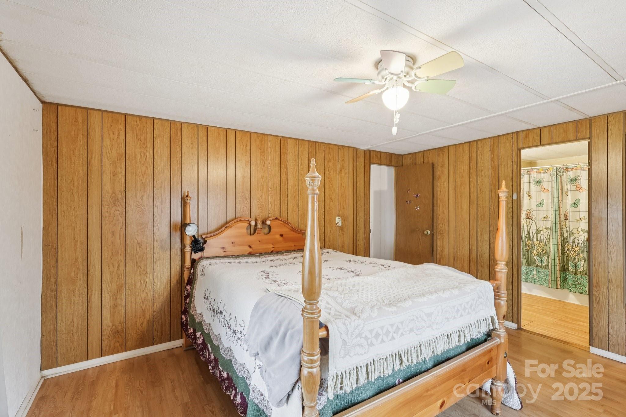 920 Dewitt Helms Road Monroe, NC 28112 - Photo 30 of 47 a bed sitting in a spacious bedroom next to a window
