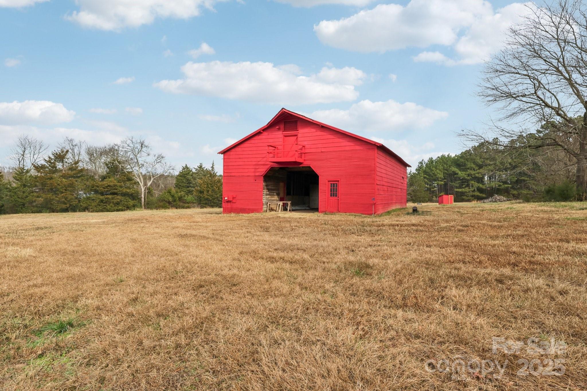 920 Dewitt Helms Road Monroe, NC 28112 - Photo 38 of 47 a view of large trees with a big yard