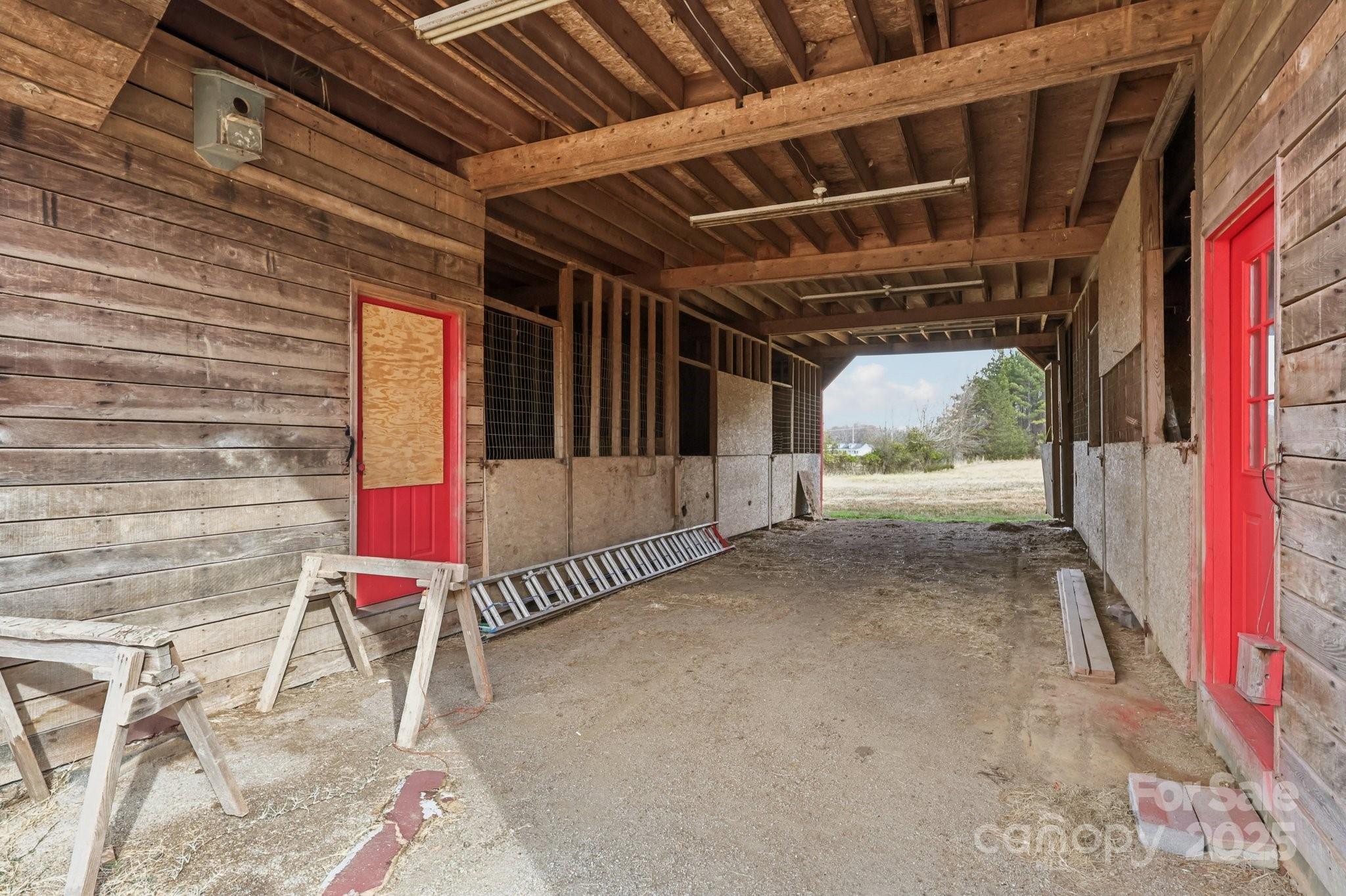 920 Dewitt Helms Road Monroe, NC 28112 - Photo 39 of 47 a view of porch with a table and chairs