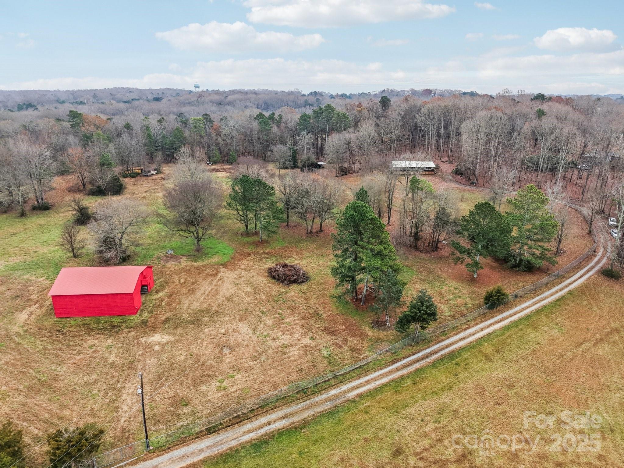 920 Dewitt Helms Road Monroe, NC 28112 - Photo 41 of 47 an aerial view of residential houses with outdoor space