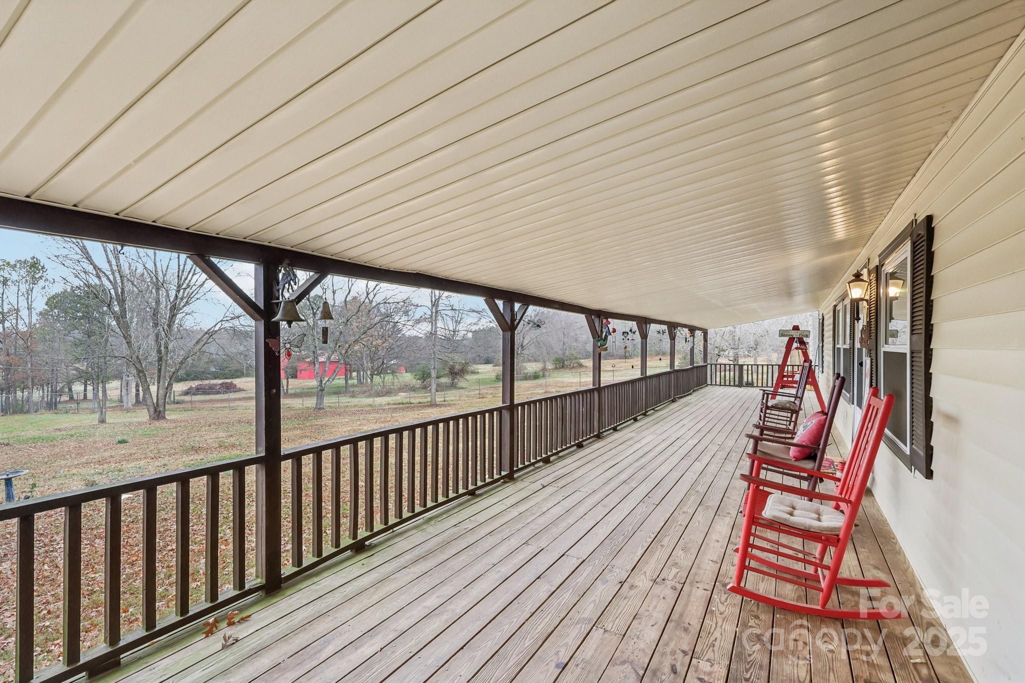 920 Dewitt Helms Road Monroe, NC 28112 - Photo 6 of 47 a view of balcony with wooden floor