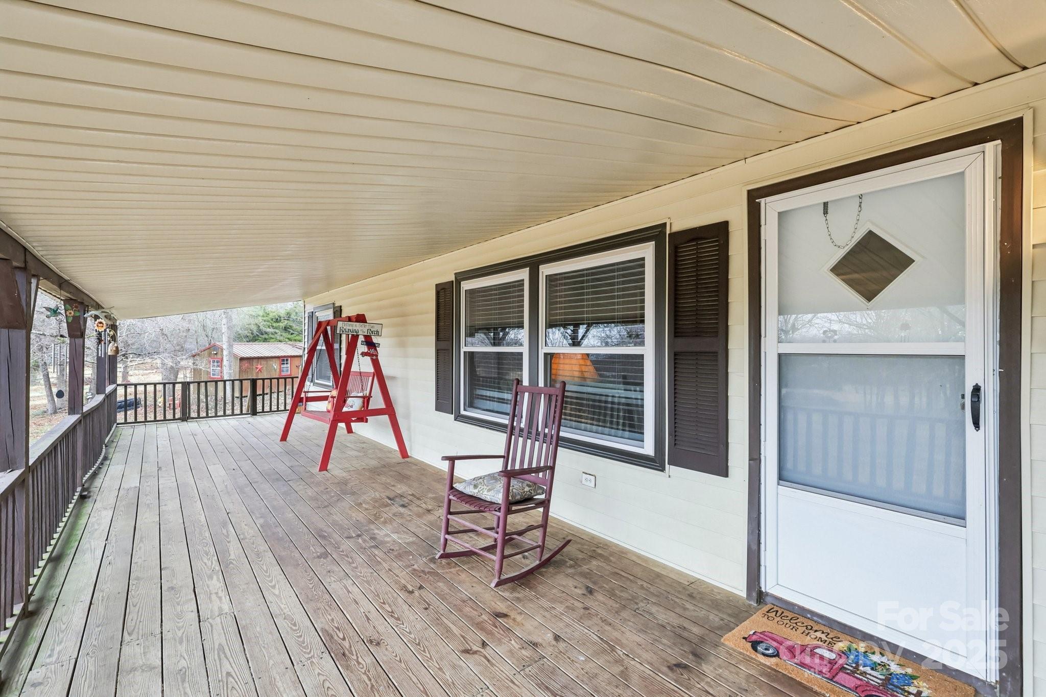 920 Dewitt Helms Road Monroe, NC 28112 - Photo 7 of 47 a view of livingroom with furniture and floor to ceiling window