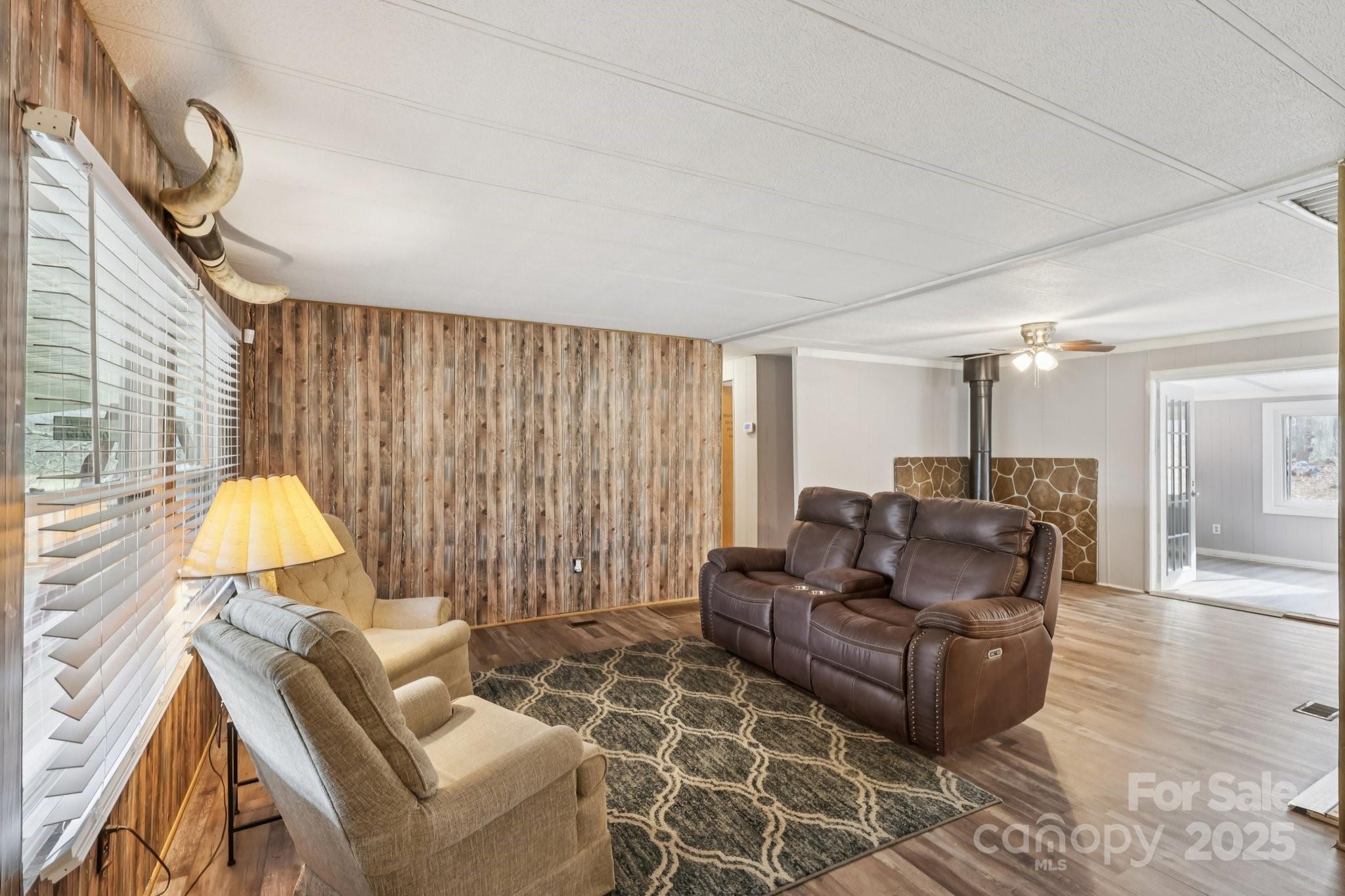 920 Dewitt Helms Road Monroe, NC 28112 - Photo 10 of 47 a living room with furniture and a entertaining space