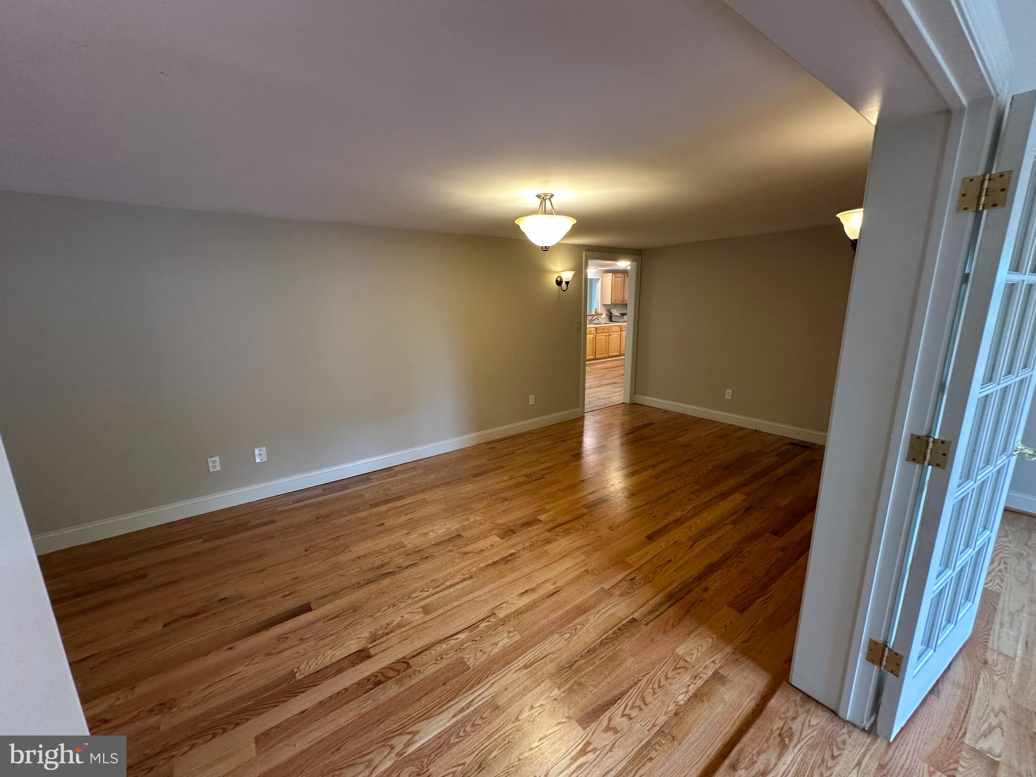 2 Whiting Avenue Boyce, VA 22620 - Photo 18 of 29 a view of an empty room with wooden floor and a window
