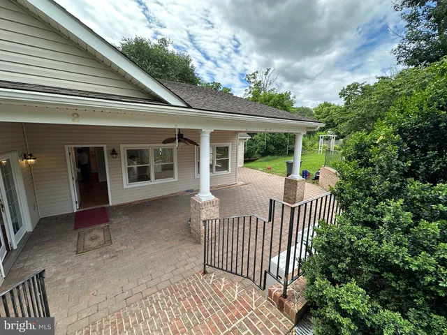 a view of a house with a porch