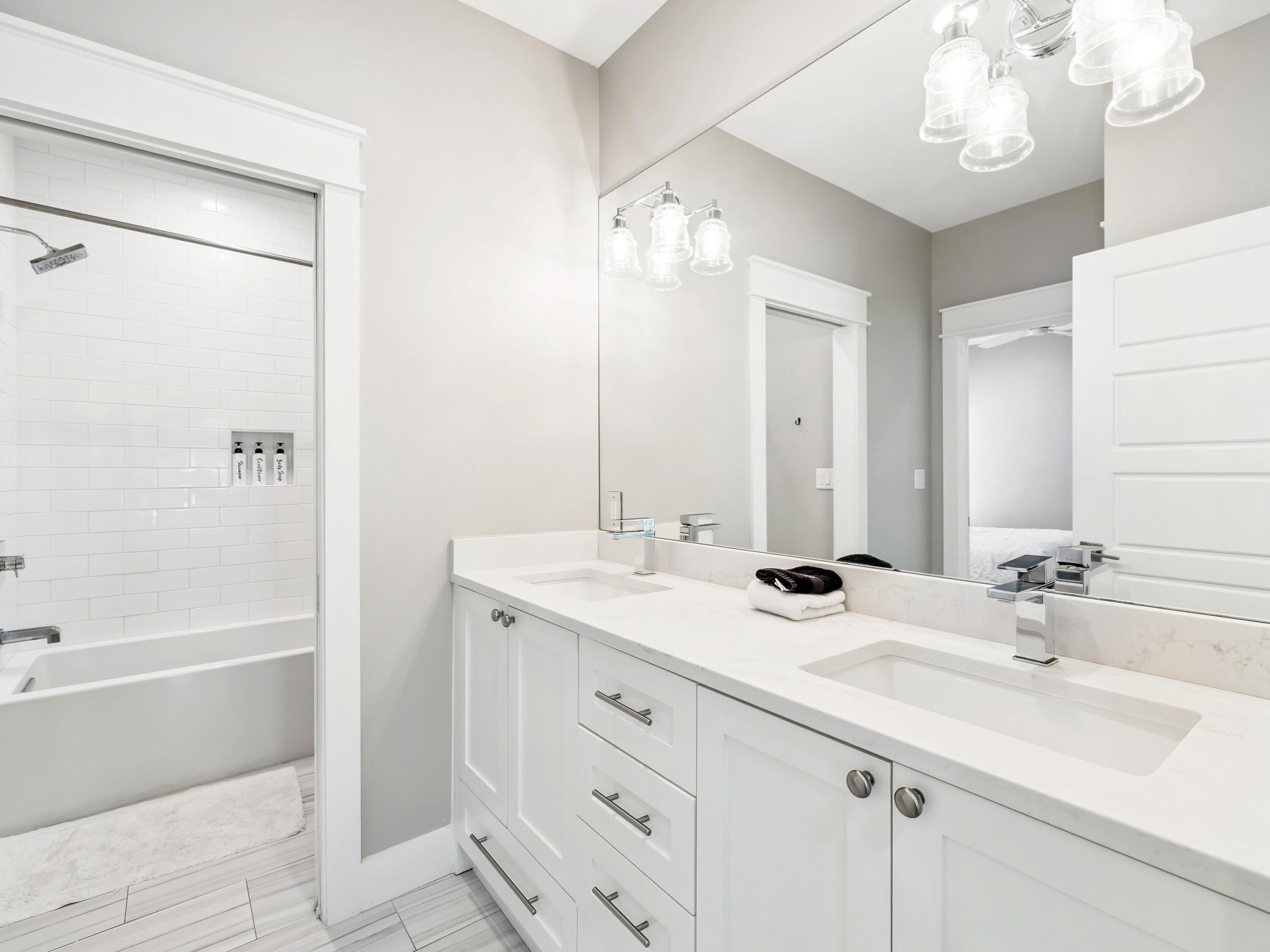 29 Tidewater Ct Inlet Beach Inlet Beach, FL 32461 - Photo 18 of 25 a bathroom with a sink double vanity and a mirror