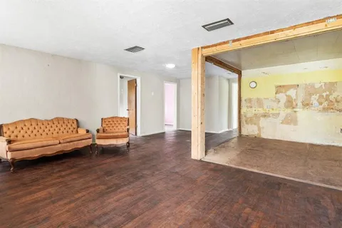 a view of livingroom with furniture and wooden floor