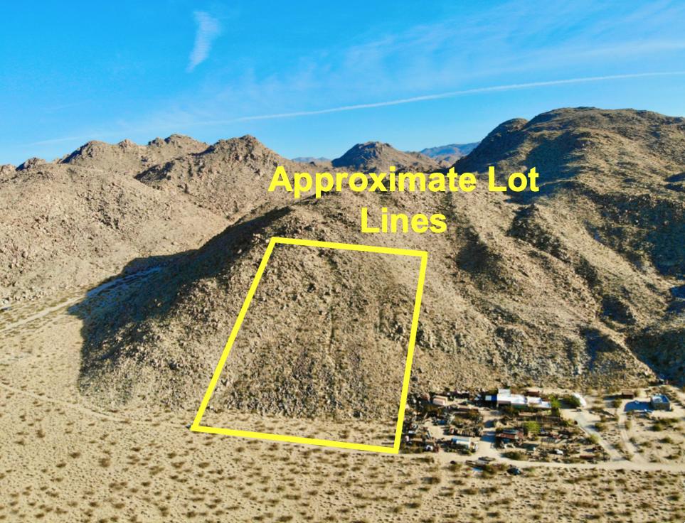 104 Sullivan Road Joshua Tree, CA 92252 - Photo 3 of 25 a view of swimming pool with a yard