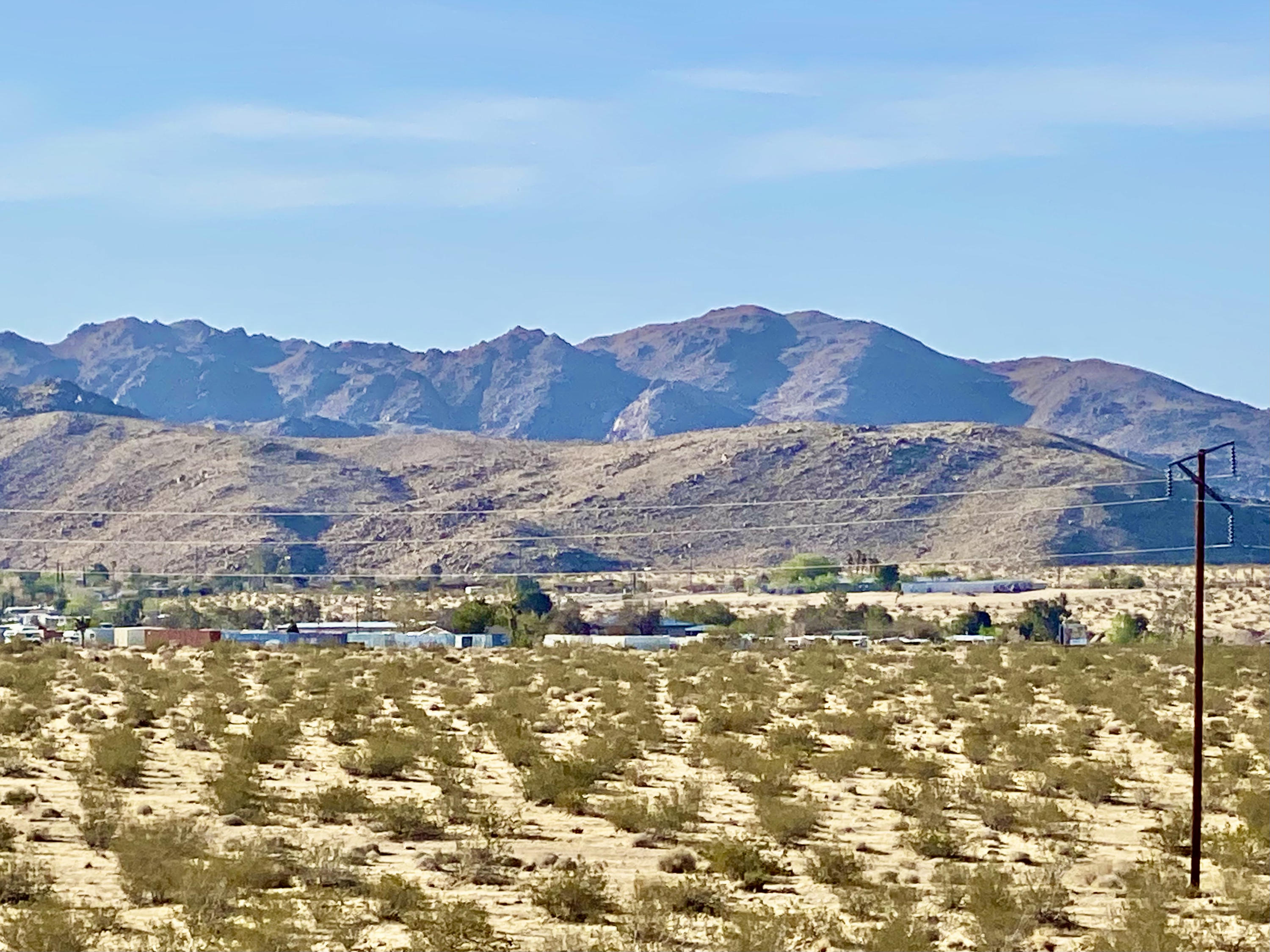 104 Sullivan Road Joshua Tree, CA 92252 - Photo 4 of 25 a view of a sky from a building