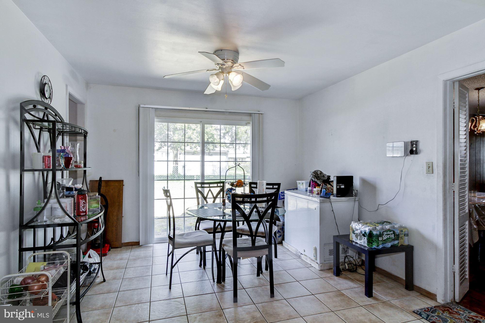 26 Bendix Lane Willingboro, NJ 08046 - Photo 11 of 21 Backyard access through kitchen