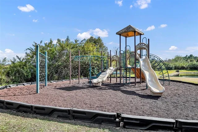 a view of a park with swings