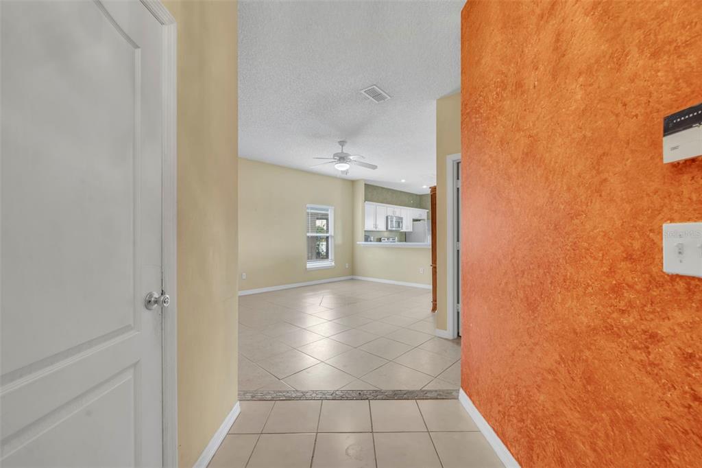 4718 Waterside Pointe Circle Orlando, FL 32829 - Photo 5 of 30 a view of a hallway
