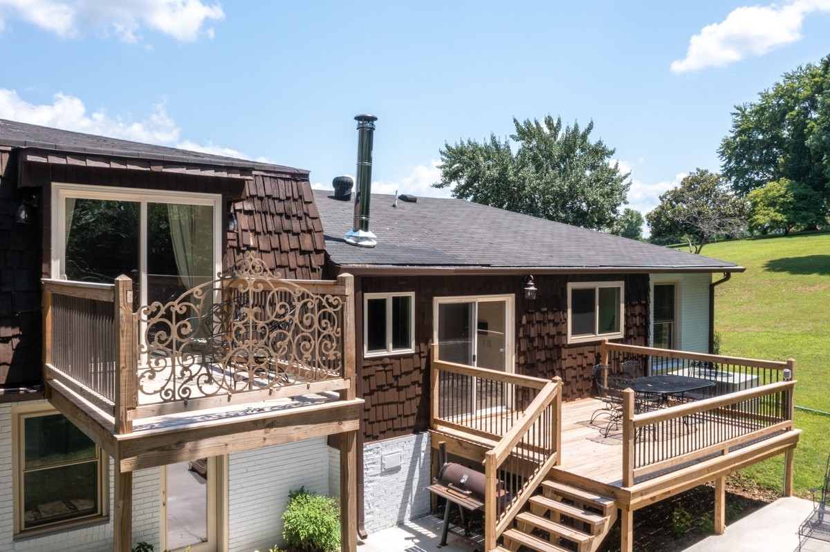 742 Bates Road Lebanon, TN 37087 - Photo 54 of 69 a view of house with a chairs and table in a patio