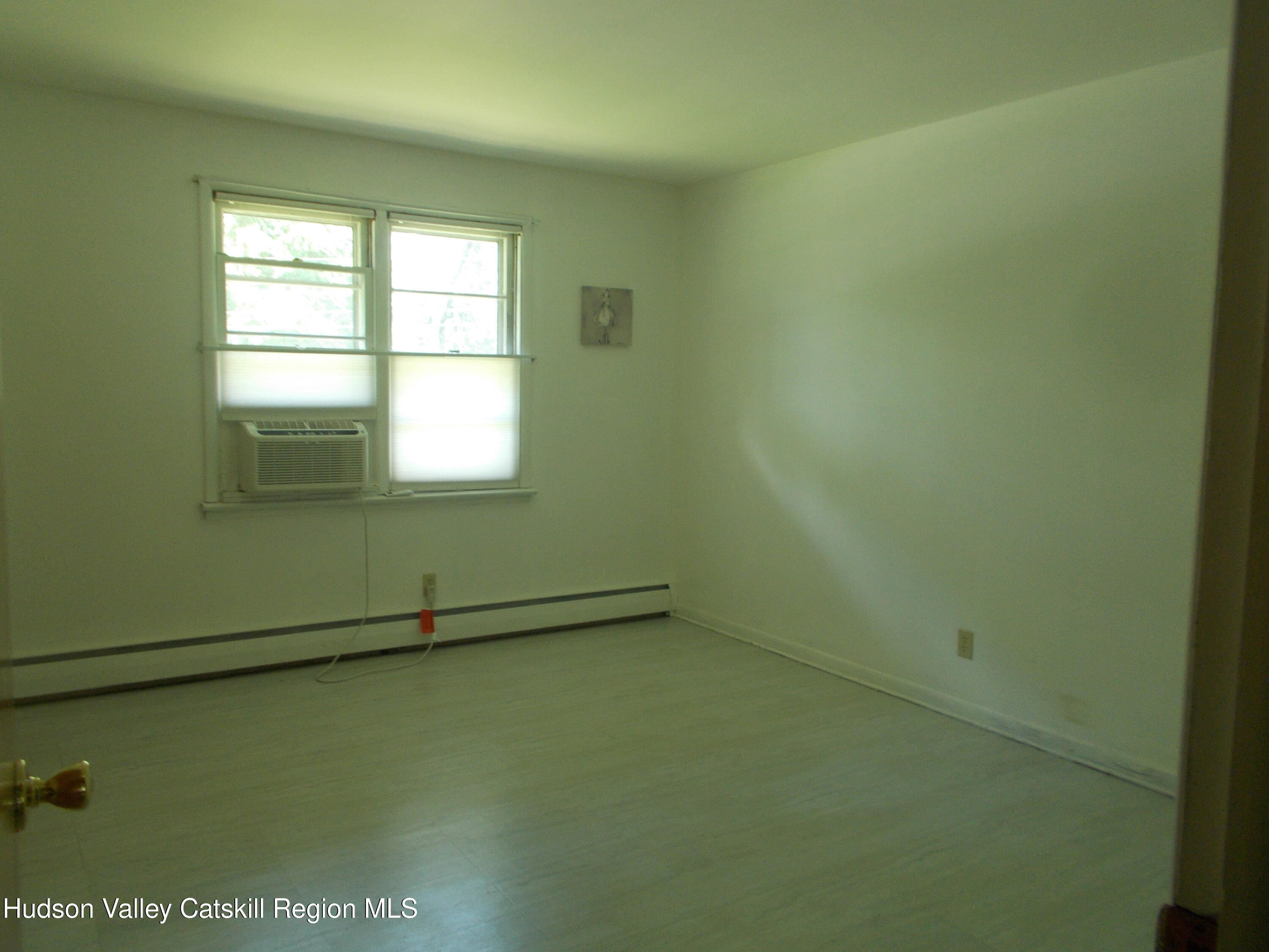 14 Strawberry Hill Road Poughkeepsie, NY 12601 - Photo 26 of 48 an empty room with a window