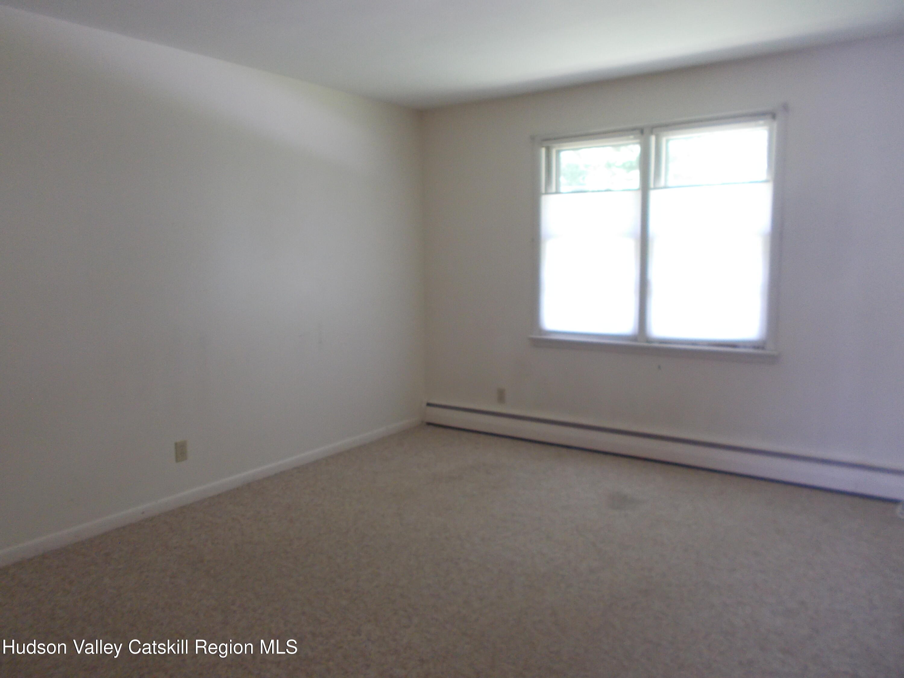 14 Strawberry Hill Road Poughkeepsie, NY 12601 - Photo 28 of 48 an empty room with a window