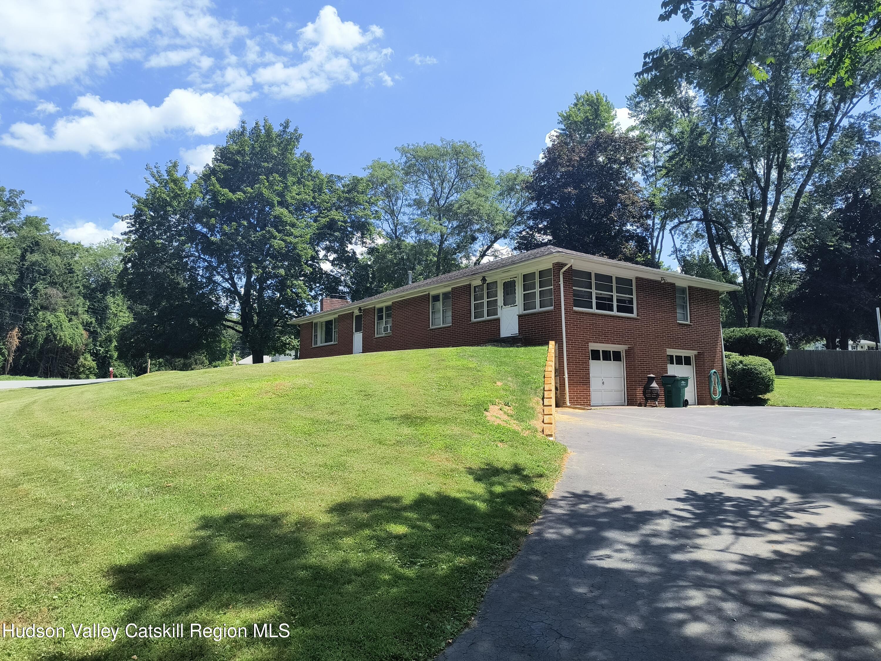 14 Strawberry Hill Road Poughkeepsie, NY 12601 - Photo 3 of 48 a front view of a house with yard and green space