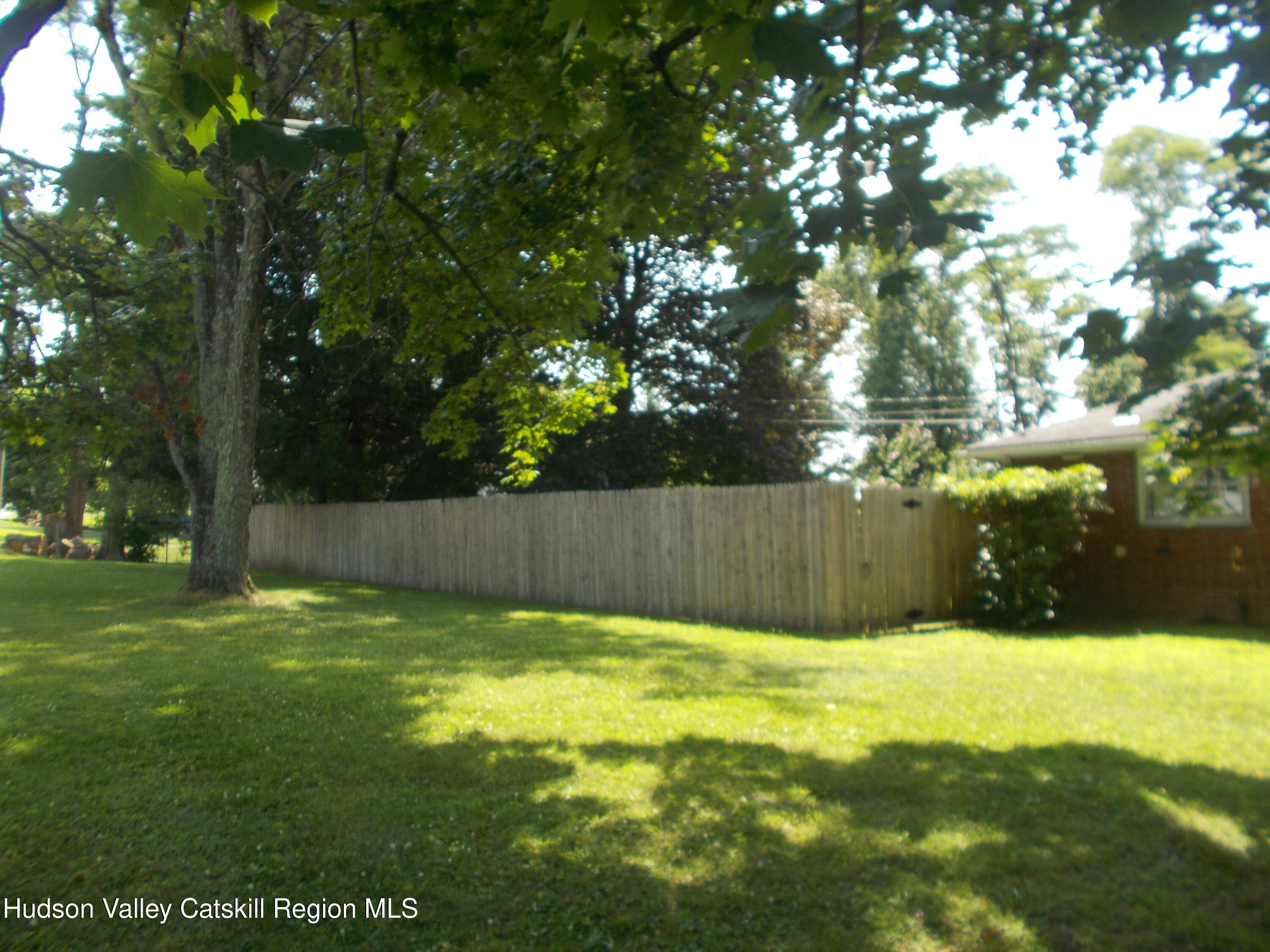 14 Strawberry Hill Road Poughkeepsie, NY 12601 - Photo 42 of 48 a view of backyard with tree