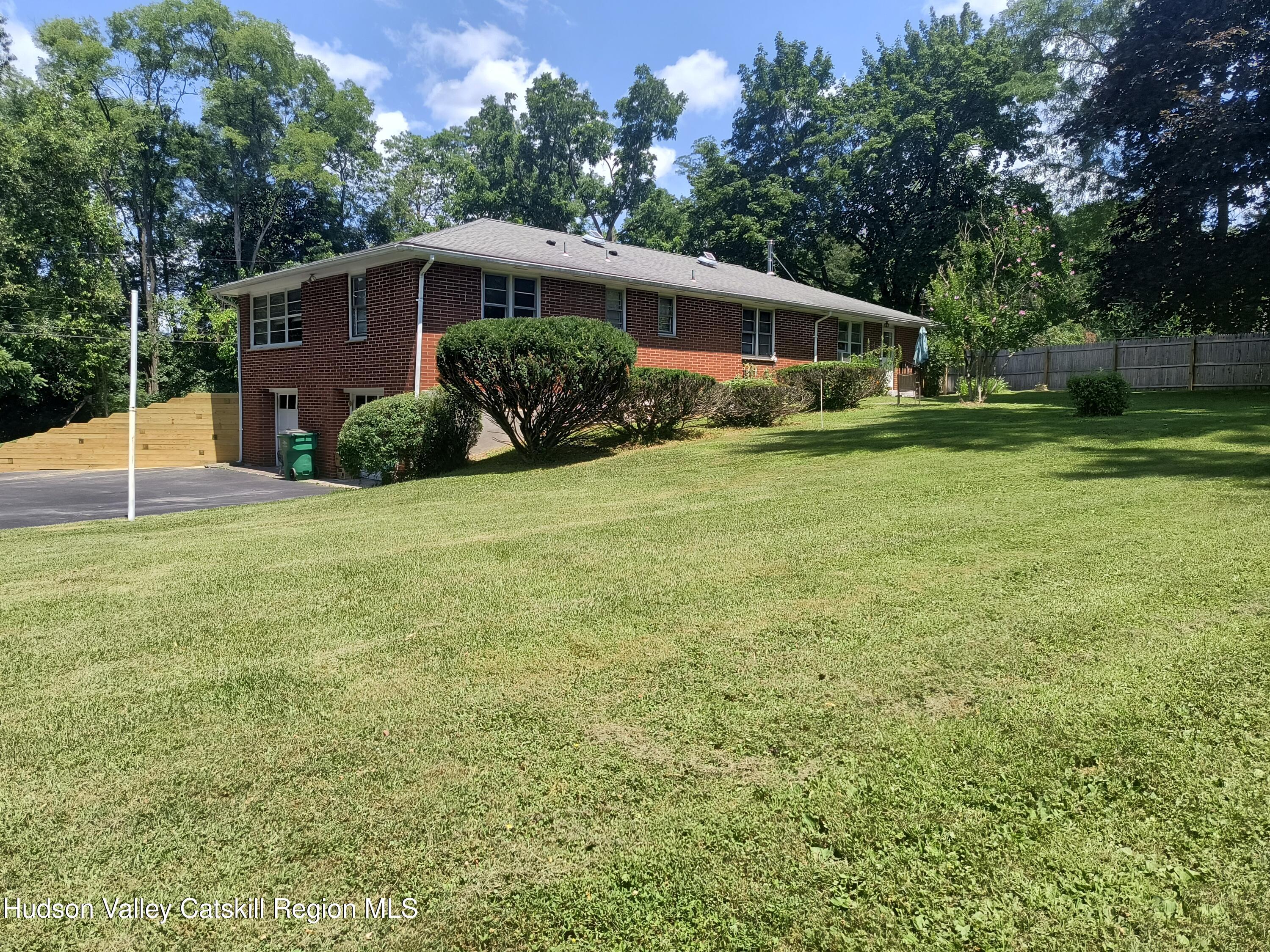 14 Strawberry Hill Road Poughkeepsie, NY 12601 - Photo 6 of 48 a view of a house with a backyard