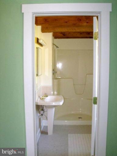 7037 Olinger Road Marshall, VA 20115 - Photo 8 of 30 a bathroom with a sink and a mirror