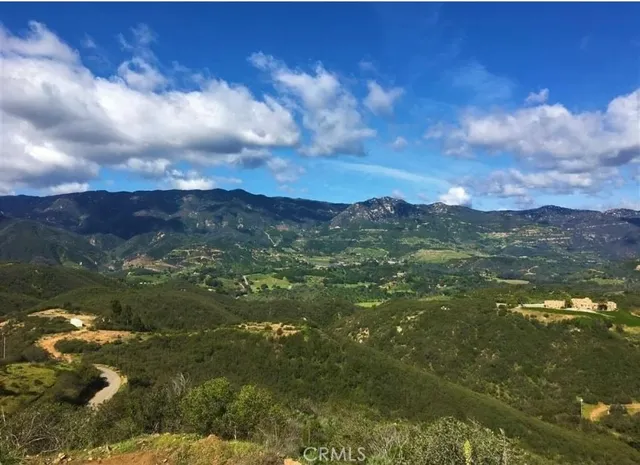 a view of lake with mountain