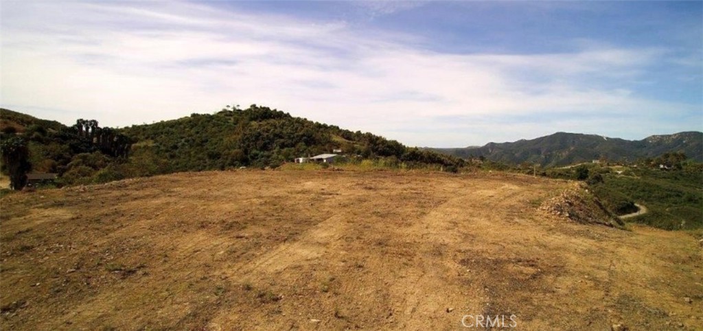 39939 Jones Road Fallbrook, CA 92028 - Photo 6 of 36 a view of lake with mountain