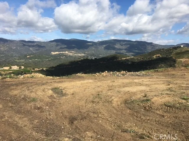 a view of mountain with lake view