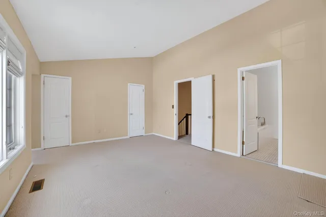 an empty room with windows