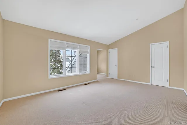 a view of a workspace with furniture