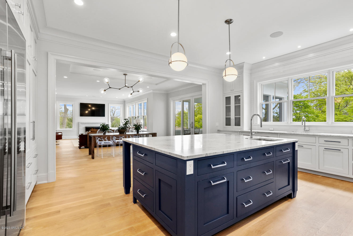 6 Perkley Lane Riverside, CT 06878 - Photo 15 of 52 a kitchen with a counter space a sink appliances and living room view