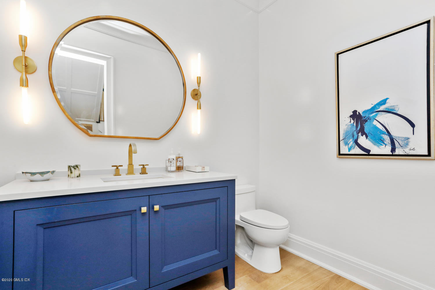 6 Perkley Lane Riverside, CT 06878 - Photo 19 of 52 a bathroom with a toilet a sink and mirror
