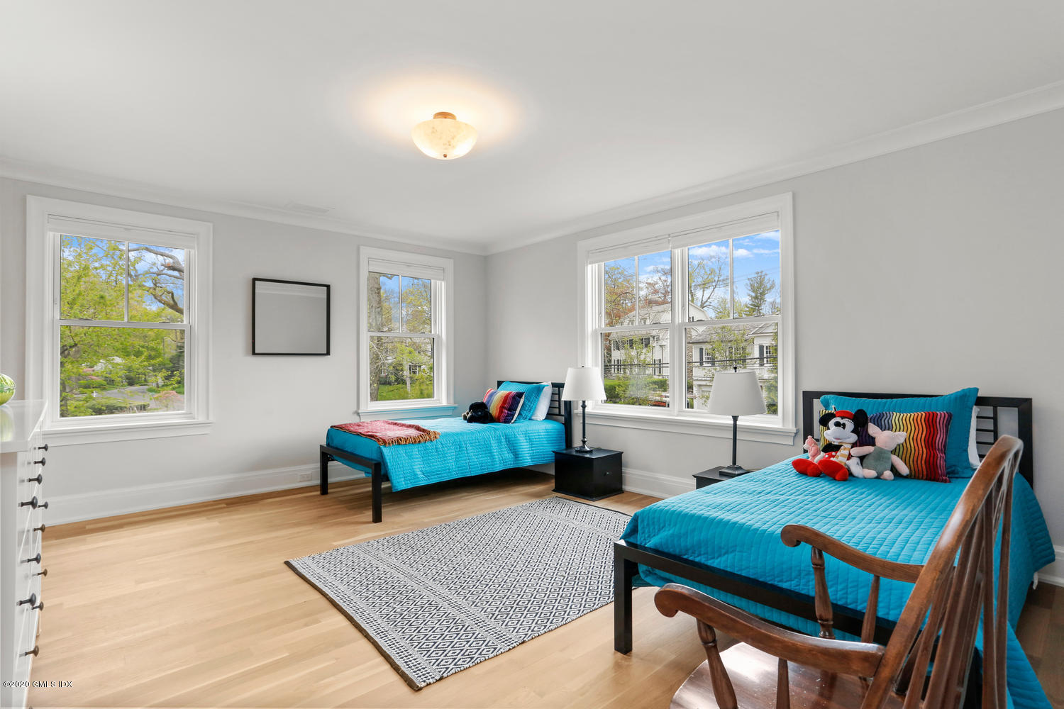 6 Perkley Lane Riverside, CT 06878 - Photo 39 of 52 a bedroom with a bed table and window